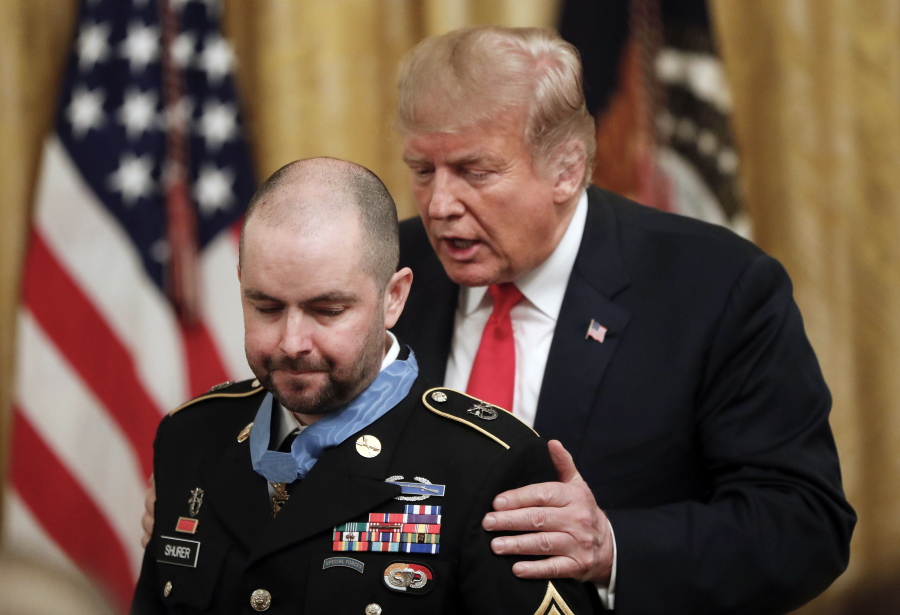 President Donald Trump Monday presents the Congressional Medal of Honor to former Army Staff Sgt. Ronald J. Shurer II for actions in Afghanistan.