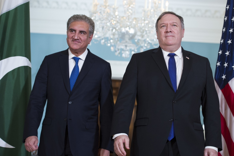 Secretary of State Mike Pompeo, right, meets Pakistani Foreign Minister Makhdoom Shah Mahmood Qureshi at the State Department in Washington, Tuesday, Oct. 2, 2018.