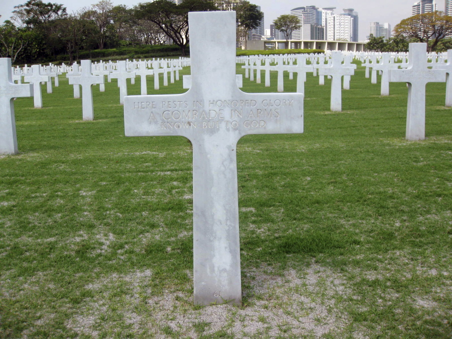 This 2011 photo provided by Ted Darcy, shows the unknown soldier grave site of Richard Murphy at the Manila American Cemetery at suburban Taguig city, east of Manila, Philippines. The body of the former journalist and U.S. Marine spent decades in this unknown soldier grave. The efforts of a volunteer researcher prompted the military to exhume the body for further testing in Hawaii. Now Murphy’s remains are expected to be brought to the Washington area in late November to be buried alongside his mother and other relatives in a family plot in Silver Spring, MD.