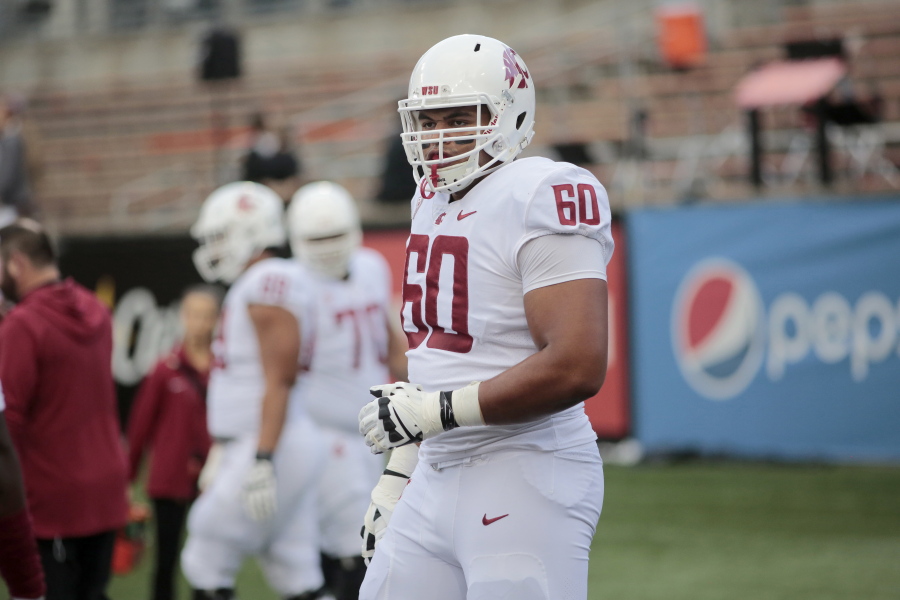 Washington State's Andre Dillard (60) before an NCAA college football in Corvallis, Ore., on Saturday Oct. 6, 2018. (AP Photo/Timothy J.