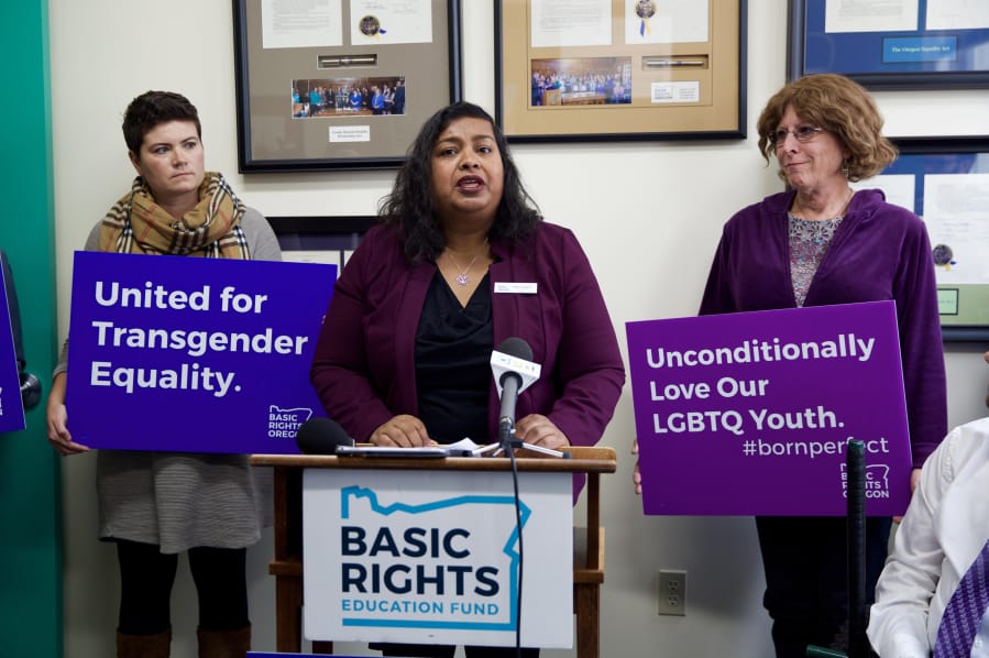 Nancy Haque, executive director of Basic Rights Oregon, speaks at a press conference Tuesday on the Trump administration proposal to narrowly define sex.