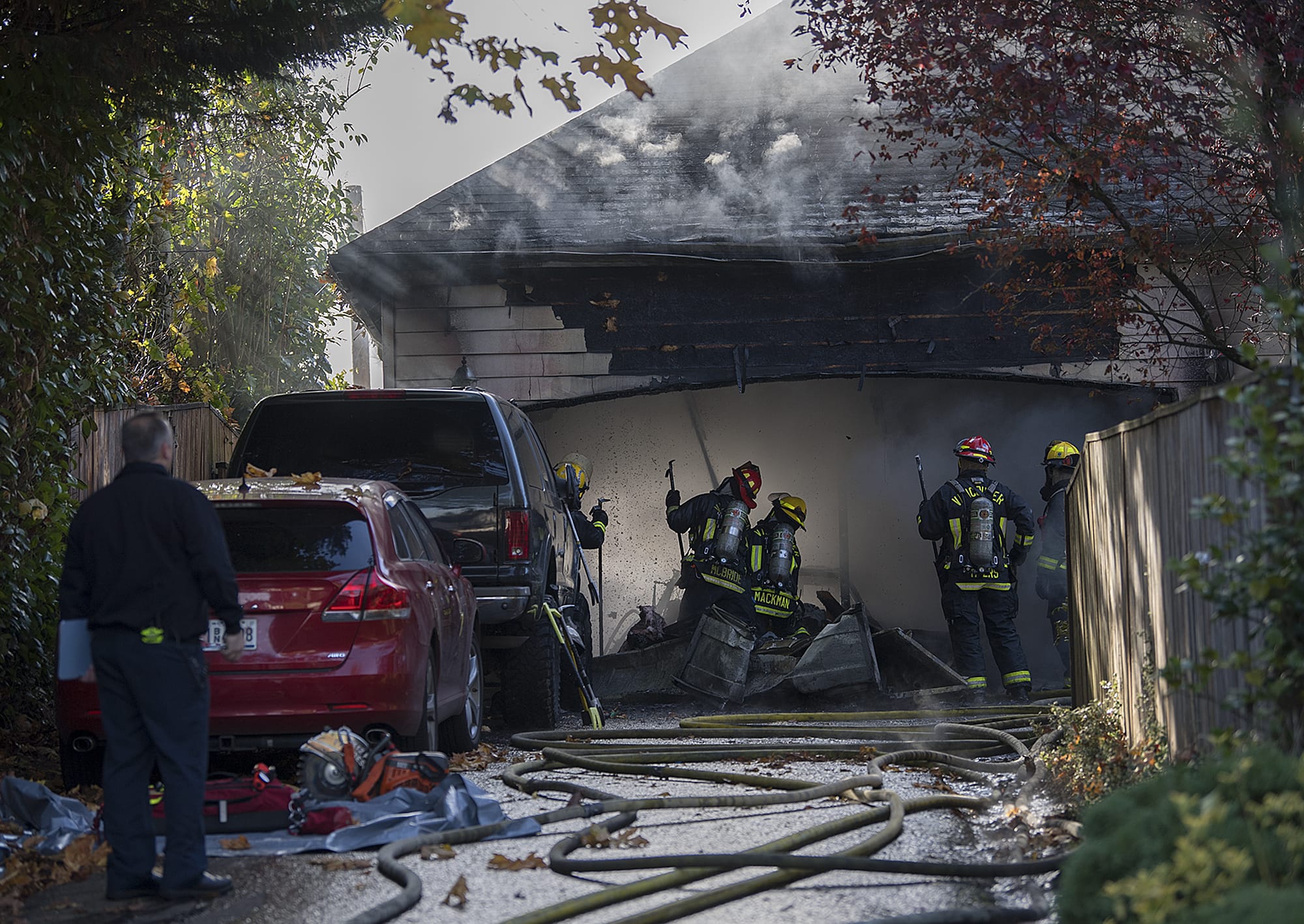 Firefighters battle a blaze at 3711 Northeast 100th Circle south of Salmon Creek on Monday morning, Nov. 12, 2018. No injuries were reported in the fire.