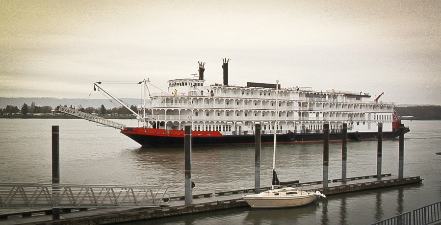 The proposed ferry service would stop at the Terminal 1 dock in Vancouver, shown here in March 2014 with the American Empress paddle-wheeled cruise vessel in the background.