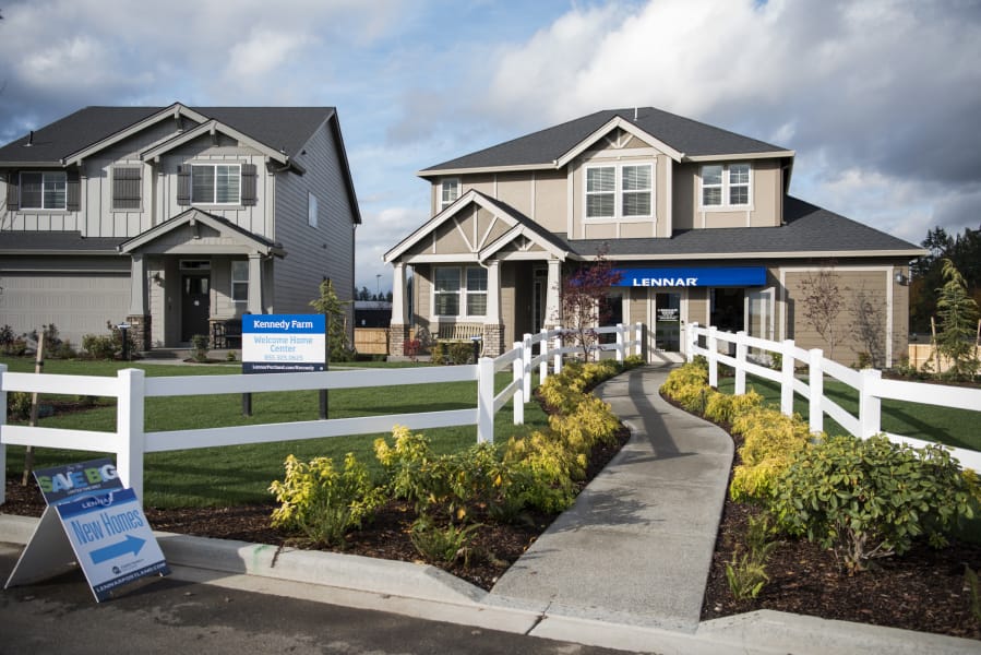 Lennar Homes homes, like this one in the Kennedy Farm subdivision in Ridgefield, come with built-in wireless access points and automated technology such as thermostat, music, lighting, entertainment and security control.