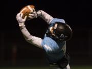 Hockinson's Peyton Brammer (9) catches a pass for a touchdown during the first round of the 2A state football playoffs against Washington in Battle Ground on Friday, Nov. 9, 2018. Hockinson defeated Washington 47-14.
