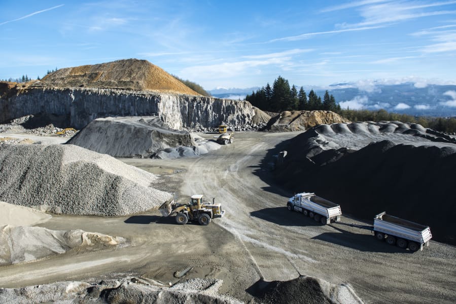 Mining basalt rock is a heavy-duty business. At the Yacolt Mountain Quarry, trucks, frontloaders and other big machines move in-demand rock to market.