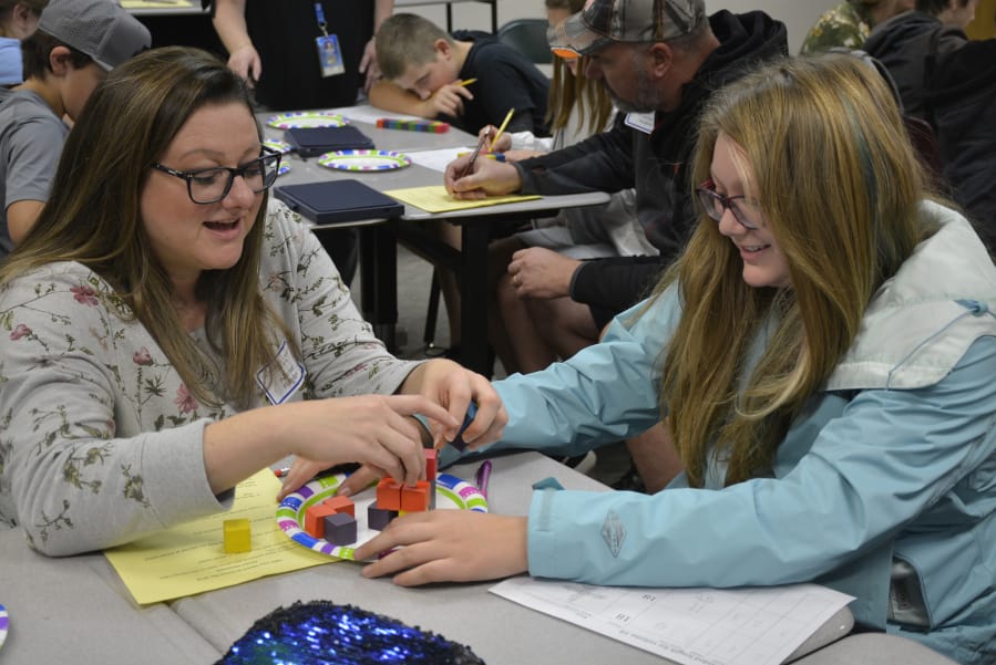 Washougal: Heather Eldridge, left, with her daughter, Olivia Eldridge, at Canyon Creek Middle School’s seventh annual Take Your Parent to School Day.