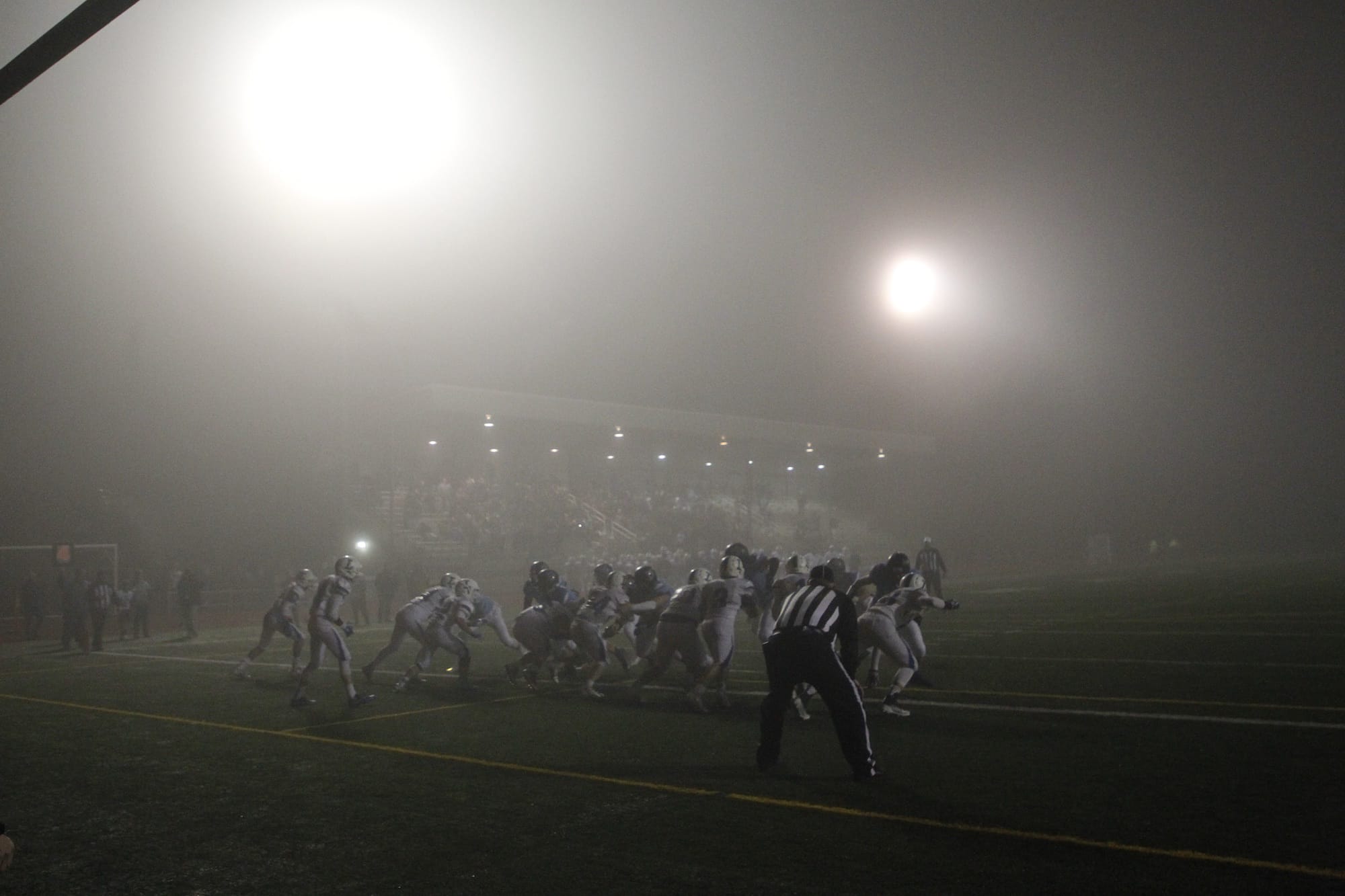 Fog shrouds the end of the Hockinson vs. Liberty game.