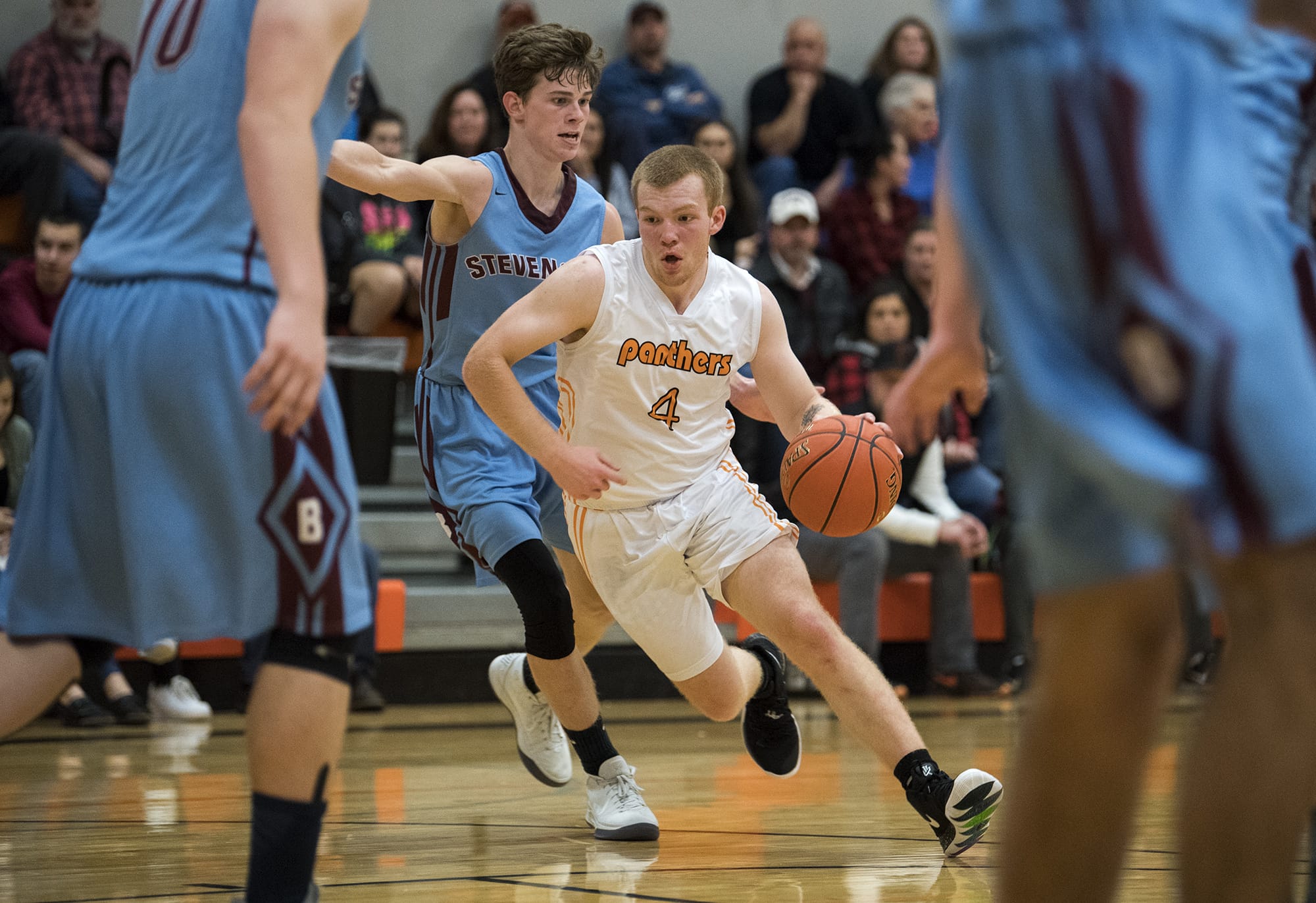 Washougal's Carter Murray (4) drives to the basket during Tuesday night's game against Stevenson in Washougal on Nov. 27, 2018. Washougal won 58-39.