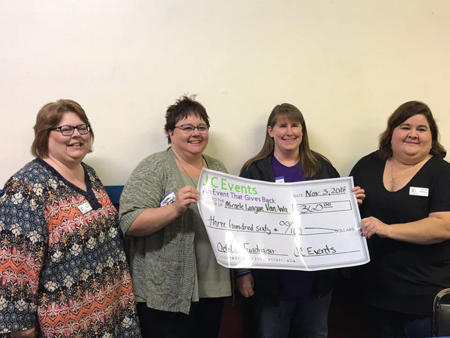 East Vancouver: JC Events raised $360 for the Miracle League of Vancouver at its Bunco Night event in October. From left: Carol Taylor of JC Events; Melissa Dodge, Miracle League executive director; Stephanie Bishop, Miracle League treasurer; and Jennifer Melton of JC Events.