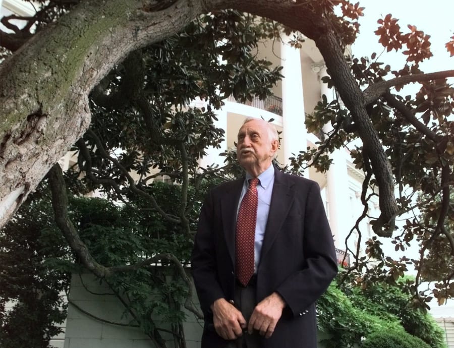 White House chief gardener Irvin Williams poses under a Magnolia Tree at the White House in May 1999.