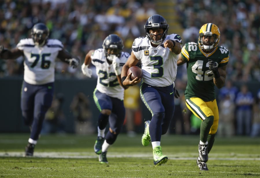 Seattle Seahawks’ Russell Wilson has had several big moments against the Green Bay Packers, including an NFC Championship win and the famous “Fail Mary” play.