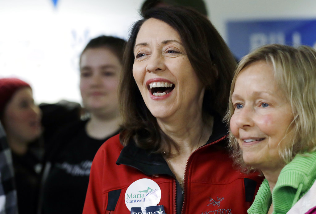 Democratic Sen. Maria Cantwell, left, smiles as she greets supporters during a campaign event, Monday, Nov. 5, 2018, in Issaquah, Wash. Former state GOP chairwoman Susan Hutchison is challenging Cantwell, a three-term incumbent. Public polling has shown Cantwell with a comfortable lead as she seeks her fourth term.