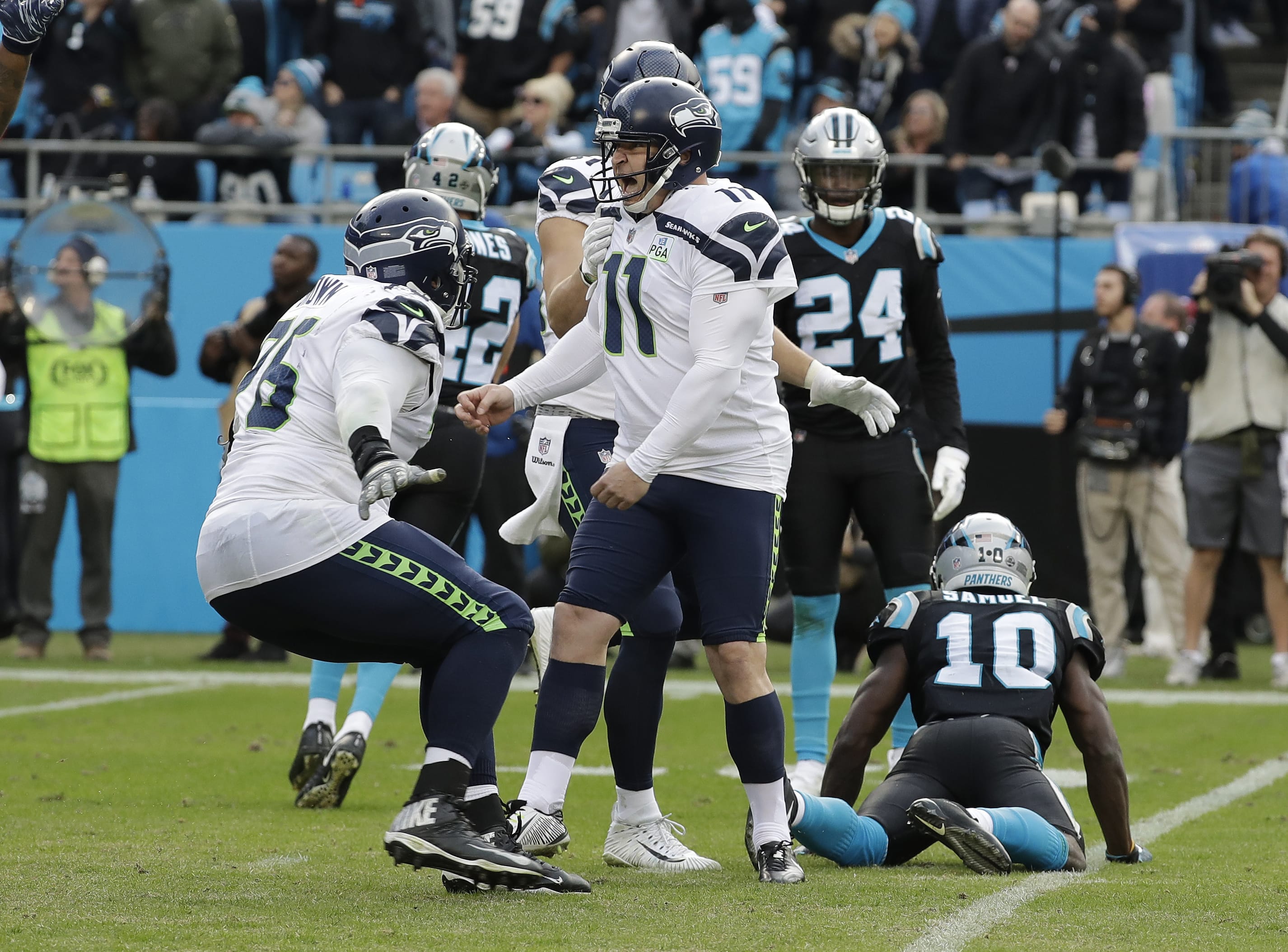 Seattle Seahawks' Sebastian Janikowski (11) celebrates after his game-winning field goal against the Carolina Panthers during the second half of an NFL football game in Charlotte, N.C., Sunday, Nov. 25, 2018.