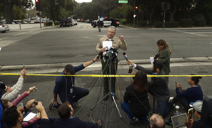Ventura County Sheriff Geoff Dean speaks to reporters near the scene in Thousand Oaks, Calif., on Thursday where a gunman opened fire the previous night inside a country dance bar crowded with hundreds of people. Ventura County sheriff’s spokesman says gunman is dead inside the bar. (AP Photo/Mark J.