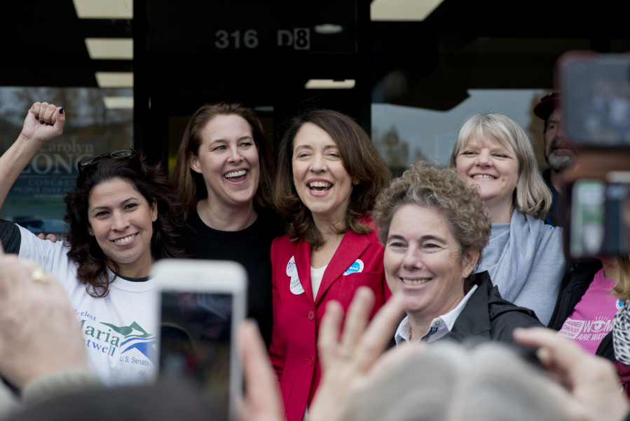Rep. Monica Stonier, from left, 3rd Congressional District candidate Carolyn Long, Sen. Maria Cantwell, D-Wash., 18th Legislative District candidate Kathy Gillespie and Barbara Melton, who is running for Clark County clerk, attend a Get Out the Vote rally Cantwell hosted Saturday afternoon at Long’s campaign office.