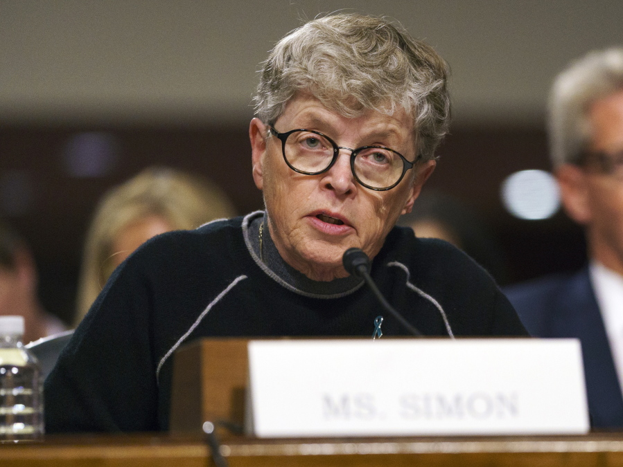 Former Michigan State President Lou Anna Simon testifies before a Senate subcommittee in Washington. Simon has been charged with lying to police conducting an investigation of Larry Nassar’s sexual abuse. Simon, who stepped down earlier this year over the scandal, was charged Tuesday, Nov. 20, 2018, with two felonies and two misdemeanors.