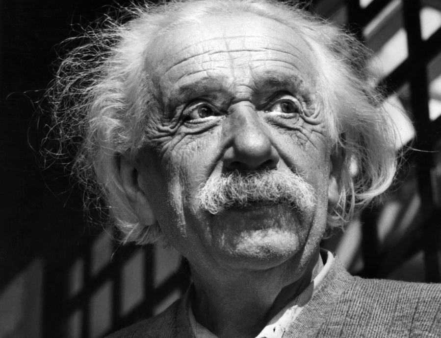 This June, 1954, file photo shows physicist Albert Einstein in Princeton, N.J. Two Einstein artifacts being auctioned in New York could contain clues to the spiritual beliefs of the 20th century’s best-known thinker. Sotheby’s is auctioning a Bible Friday, Nov.