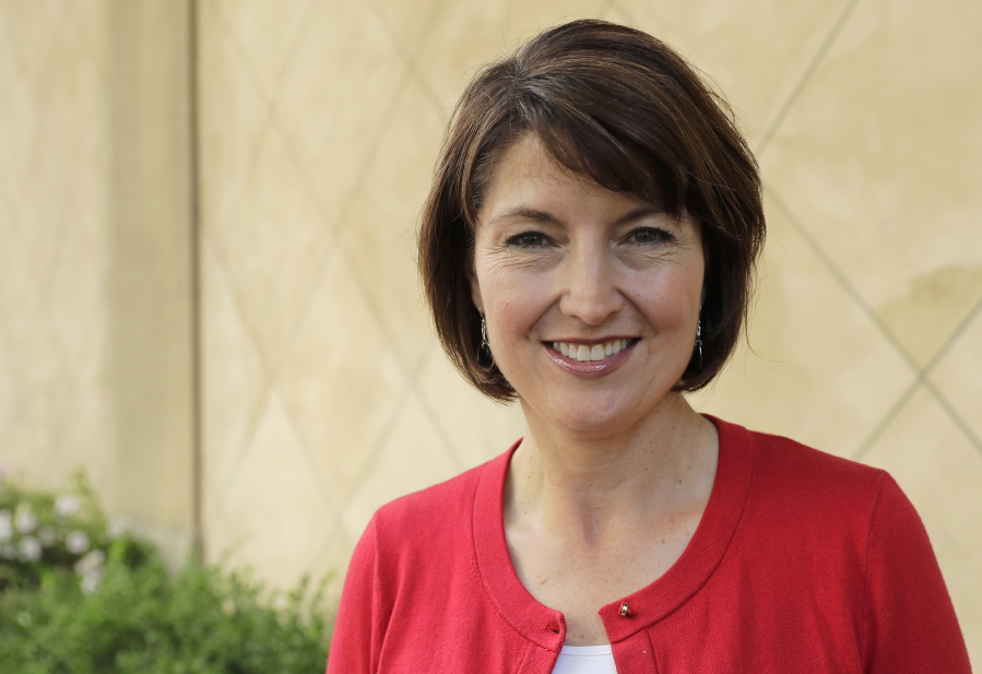 In this Aug. 22, 2018 photo, U.S. Rep. Cathy McMorris Rodgers, R-Wash., poses for a photo in Spokane, Wash. McMorris Rodgers, who is fourth in House leadership and the highest ranking woman in the GOP, is facing a formidable challenge in the 5th Congressional District from Democrat Lisa Brown. (AP Photo/Ted S.