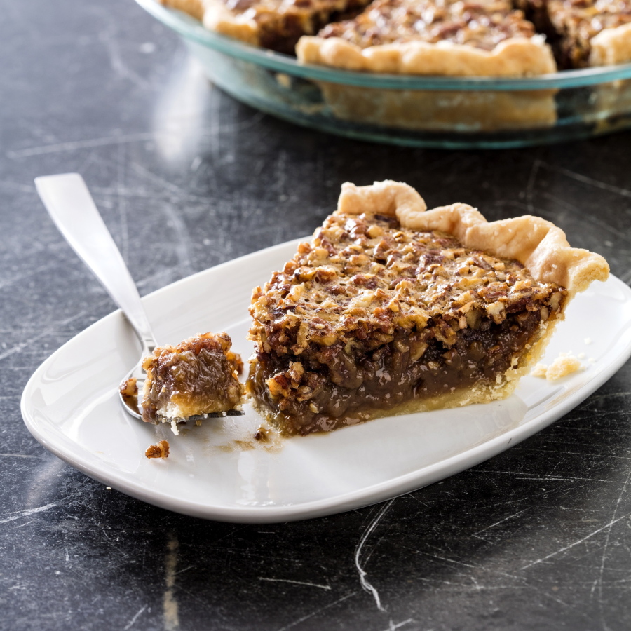 Classic pecan pie. This recipe appears in the cookbook “All-Time Best Holiday Entertaining.” (Daniel J.