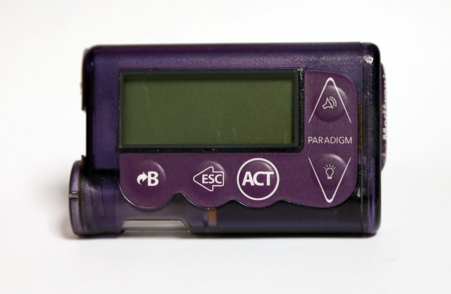 This Nov. 14, 2018 photo taken in Jackson, Miss., shows the Medtronic Paradigm REAL-Time Revel insulin pump of Polly Varnado’s daughter. Medical device manufacturers and experts say insulin pumps are safe. But an AP investigation found that insulin pumps and their components are responsible for the highest number of malfunction, injury and death reports in the U.S. Food and Drug Administration’s medical device database. (AP Photo/Rogelio V.
