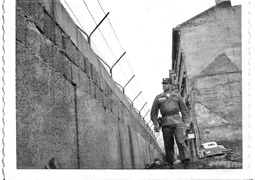 Vancouver’s Harry Daniels, then a lieutenant in the Army, walks past a section of the Berlin Wall some time during his tour in the divided city, from 1960 to 1962.