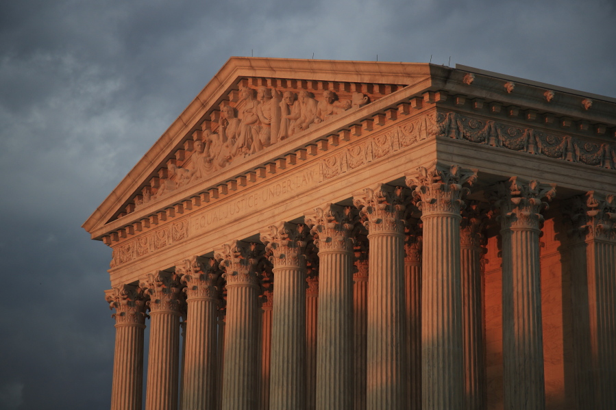 The U.S. Supreme Court is seen at sunset in Washington on Oct. 4. The court issued its first ruling of the session on Tuesday.