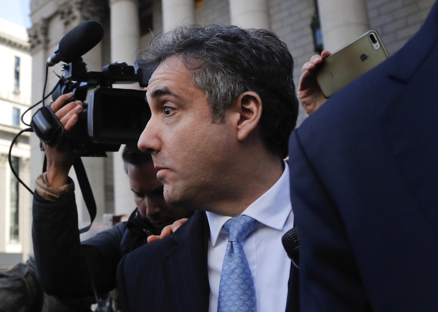 Michael Cohen walks out of federal court, Thursday, Nov. 29, 2018, in New York, after pleading guilty to lying to Congress about work he did on an aborted project to build a Trump Tower in Russia.