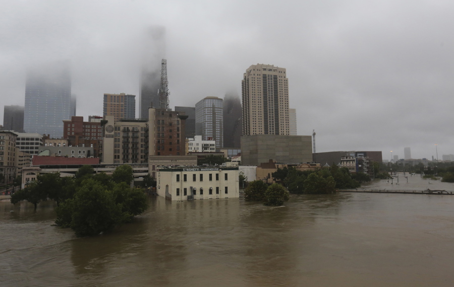 Floodwaters from Tropical Storm Harvey overflow from Buffalo Bayou on Aug. 28, 2017, in downtown Houston, Texas.