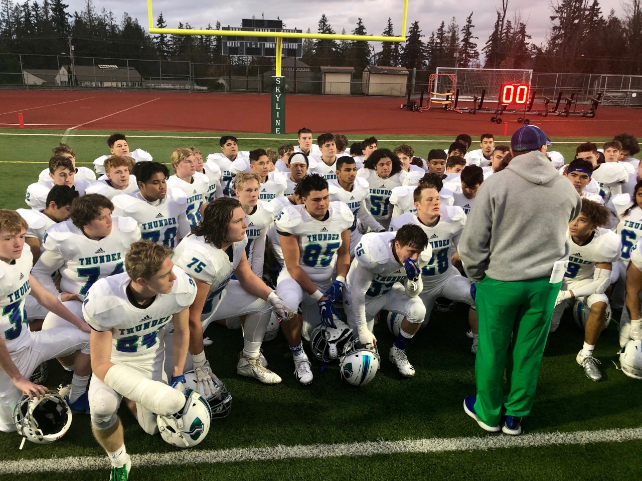 Mountain View head coach Adam Mathieson addresses his team moments after a 24-7 loss to O'Dea in the 3A state semifinals at Skyline High School on Saturday, Nov. 24, 2018.