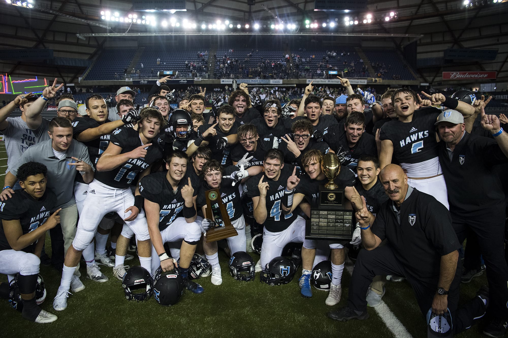 The Hawks celebrate after winning their second straight 2A state football championship game on Saturday, Dec. 1, 2018, in Tacoma, Wash. Hockinson defeated Lynden 42-37.