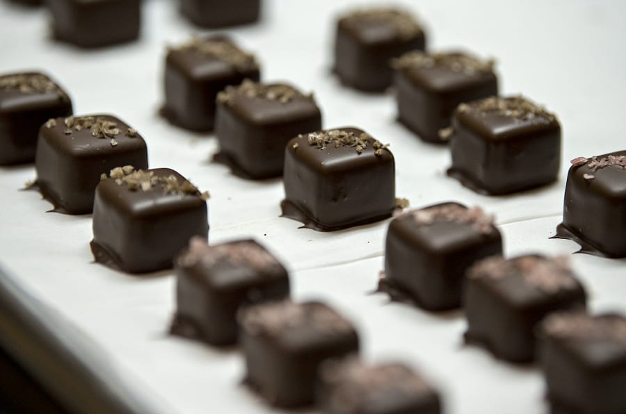 A fresh batch of salted caramels is pictured at Whimsy Chocolates. The Battle Ground-based company partnered with Jacobsen Salt Co. of Portland to offer different flavors of salted caramels.