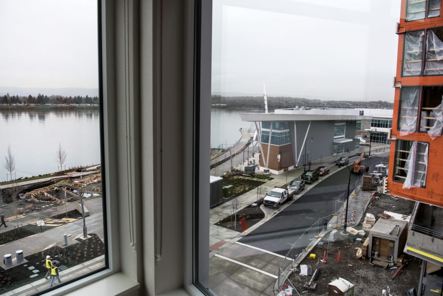 A fourth floor apartment at the Rediviva at The Waterfront Vancouver offers a view of the Columbia River. Fifty-eight of the building’s 63 units feature outside decks.