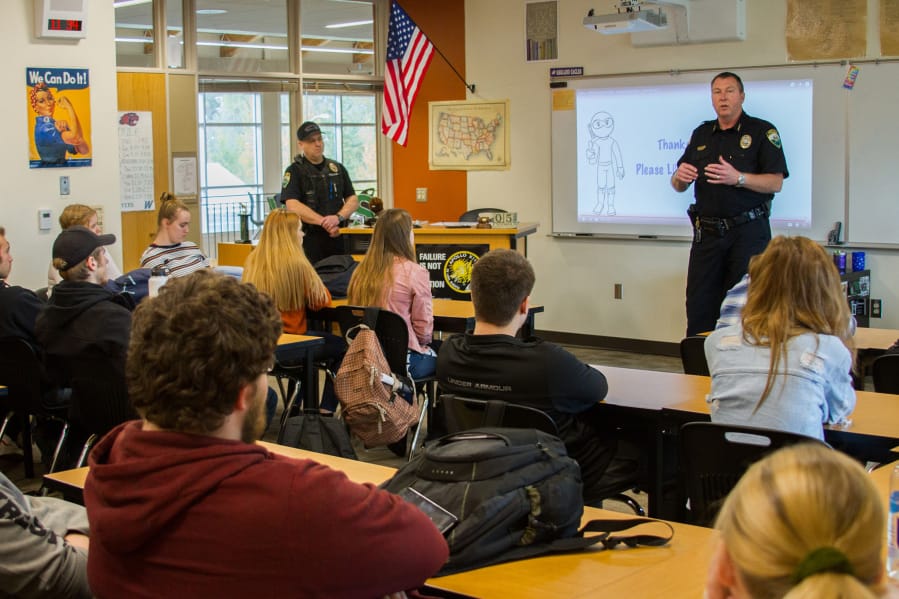 Woodland: Police Chief Jim Kelly and officer Brent Murray visited Katie Klaus’ government class at Woodland High School.