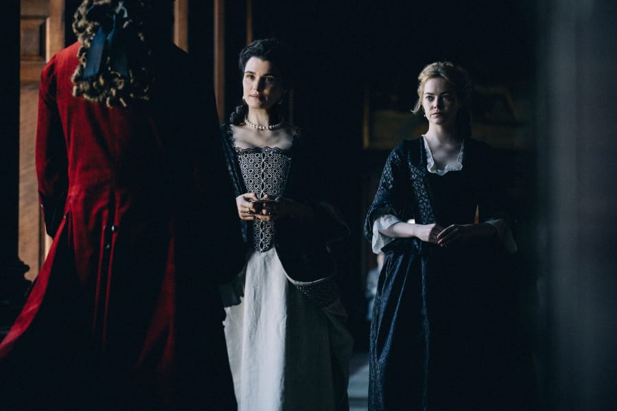 Rachel Weisz, left, and Emma Stone in “The Favourite.” Atsushi Nishijima/Fox Searchlight Pictures