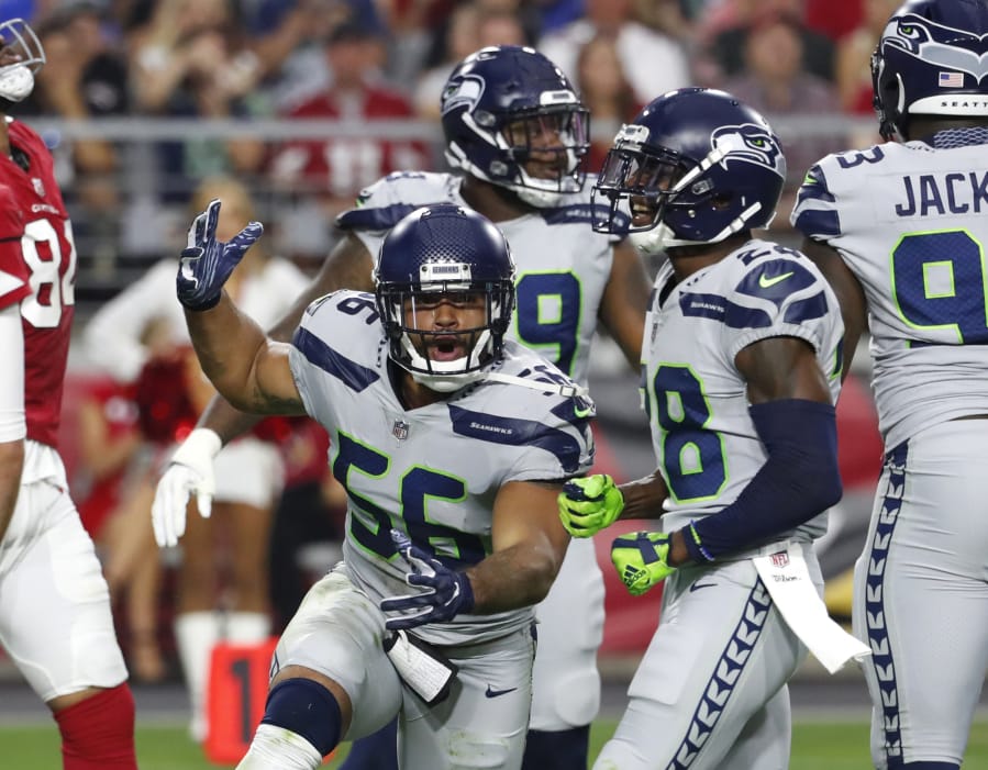 Seattle Seahawks linebacker Mychal Kendricks (56) is eager to get back to the normalcy provided by life on a football field. The 28-year old Kendricks is returning from an eight-game suspension due to violations of the NFL's personal conduct policy stemming from guilty pleas to insider trading charges in September.