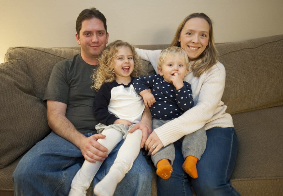 Korey Cochran, from left, with his children, Kyrsten and Kynen, and his wife, Kerry, at their home in Vancouver in December 2015. Cochran had been diagnosed with a rare type of terminal brain tumor. He died in January 2017 at 38 years old.