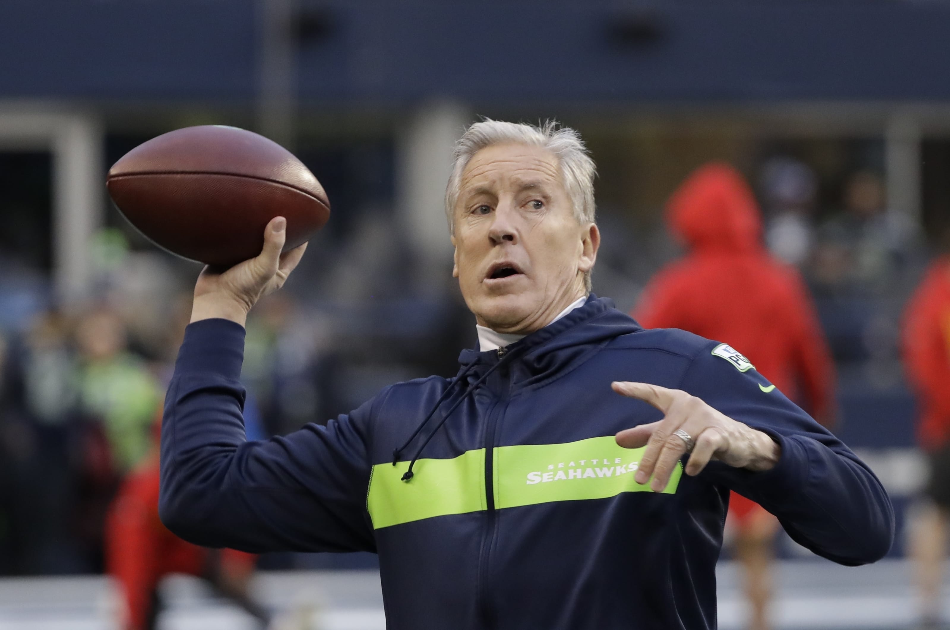 Seattle Seahawks head coach Pete Carroll passes during warmups before an NFL football game against the Kansas City Chiefs, Sunday, Dec. 23, 2018, in Seattle.
