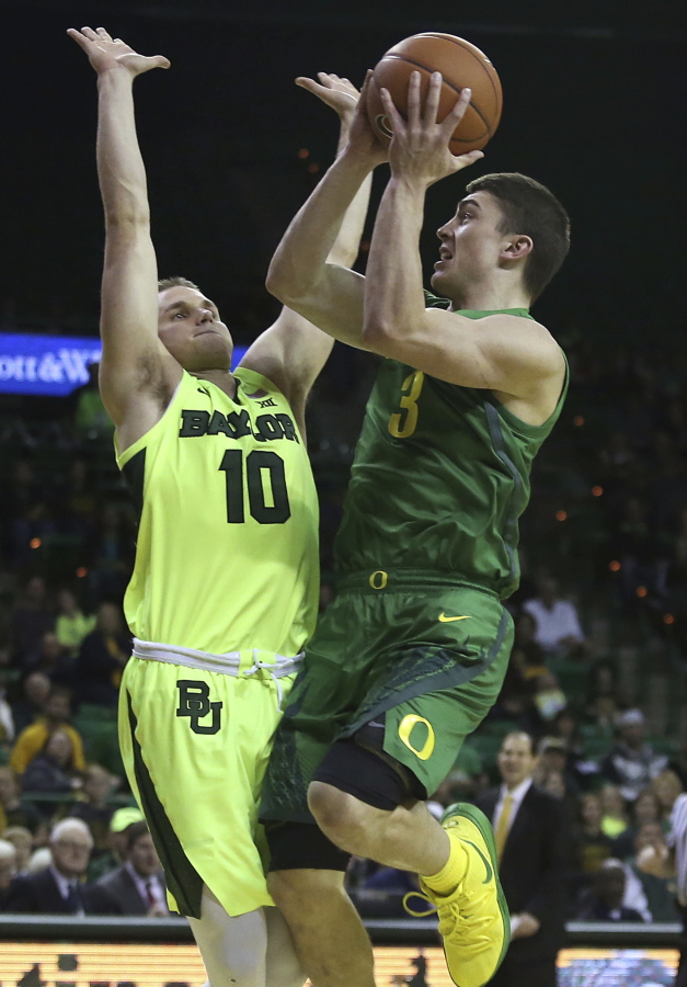 Oregon guard Payton Pritchard (3) shoots past Baylor guard Makai Mason (10) in the first half of an NCAA college basketball game Friday Dec. 21, 2018, in Waco, Texas.