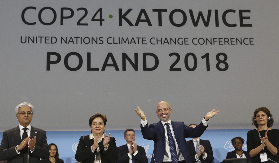 Michal Kurtyka, a senior Polish official chairing the negotiations, reacts after the final agreement was adopted Saturday during a closing session of the COP24 U.N. Climate Change Conference 2018 in Katowice, Poland.
