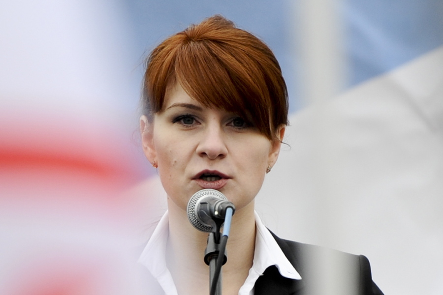 Maria Butina, leader of a pro-gun organization in Russia, speaks to a crowd during a rally in support of legalizing the possession of handguns in Moscow, Russia. Prosecutors say they have “resolved” a case against Butina accused of being a secret agent for the Russian government, a sign that she likely has taken a plea deal. The information was included in a court filing Monday.