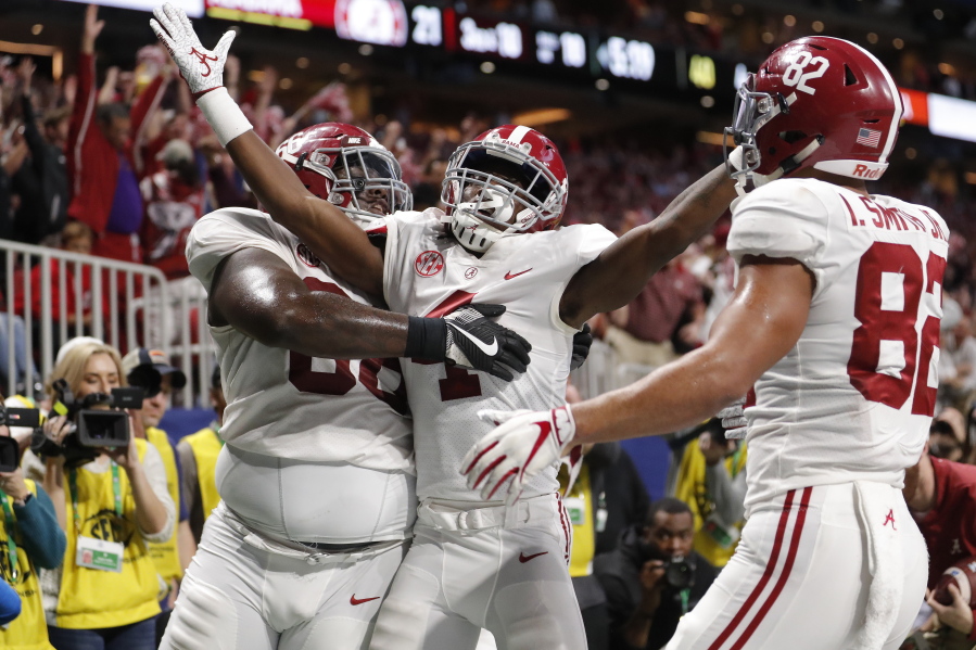 Alabama wide receiver Jerry Jeudy (4) celebrates his touchdown against Georgia during the second half of the Southeastern Conference championship NCAA college football game, Saturday, Dec. 1, 2018, in Atlanta.