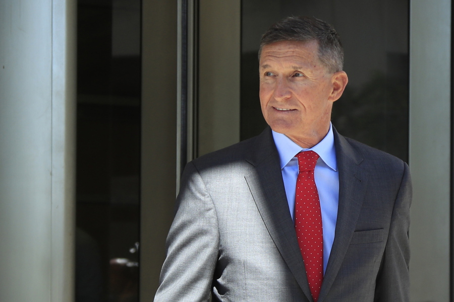 FILE - In this July 10, 2018 file photo, former Trump national security adviser Michael Flynn leaves federal courthouse in Washington, following a status hearing.