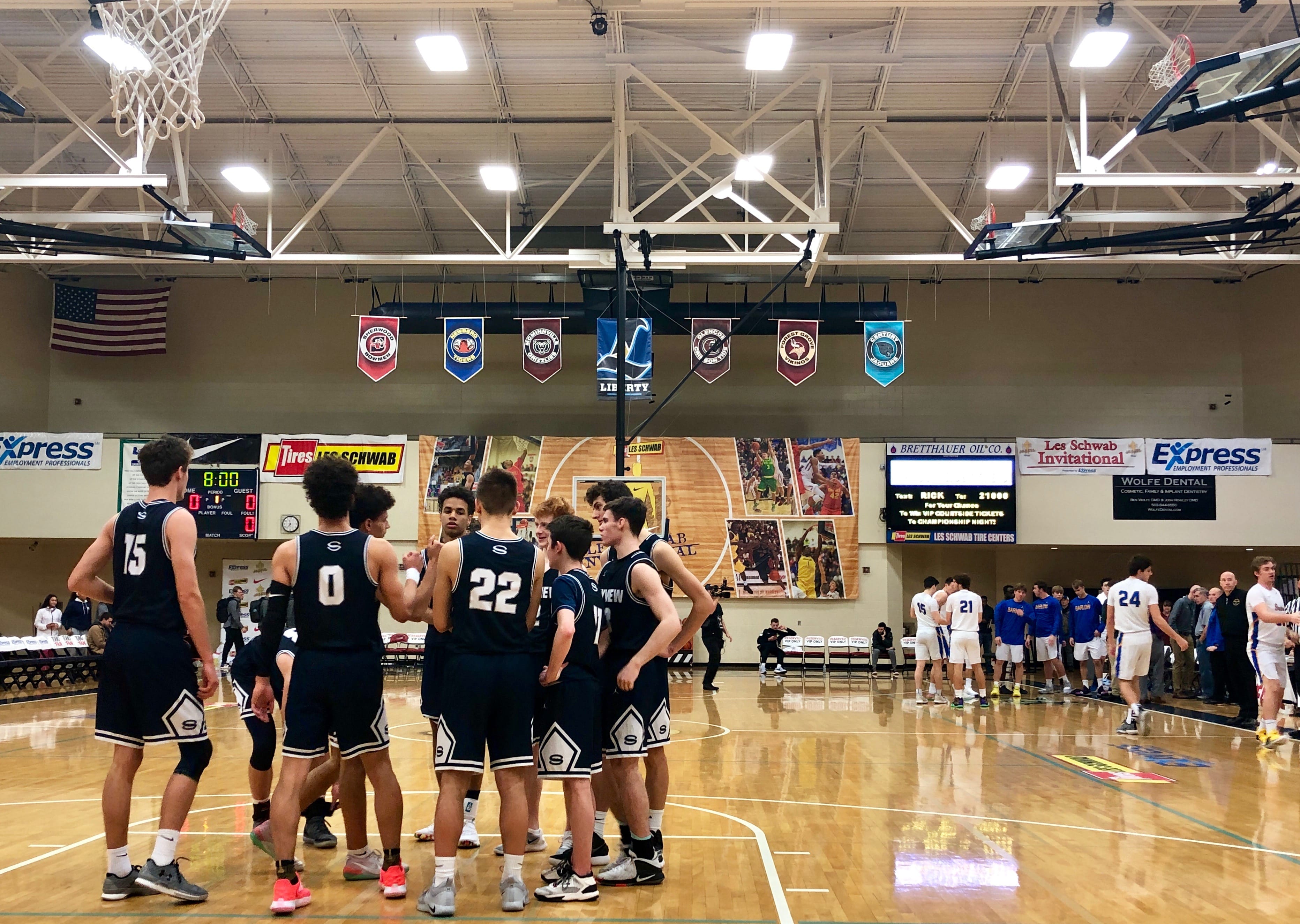 Skyview huddles before taking the court against Barlow (Ore.), a game it won 60-55 on the third day of the Les Schwab Invitational.