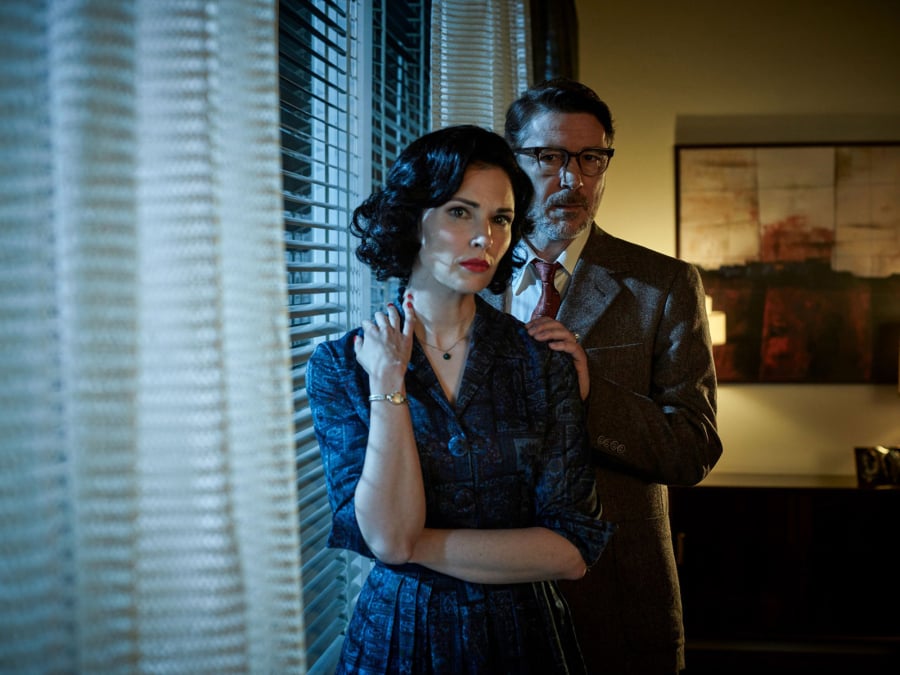 Laura Mennell as Mimi Hynek and Aiden Gillen as Dr.