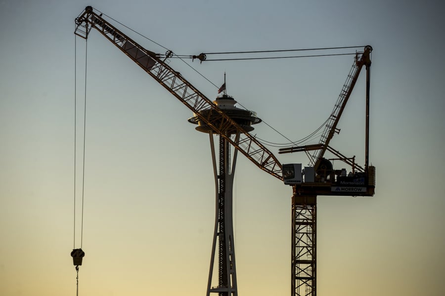 A South Lake Union crane obscures the Space Needle on Dec. 5.