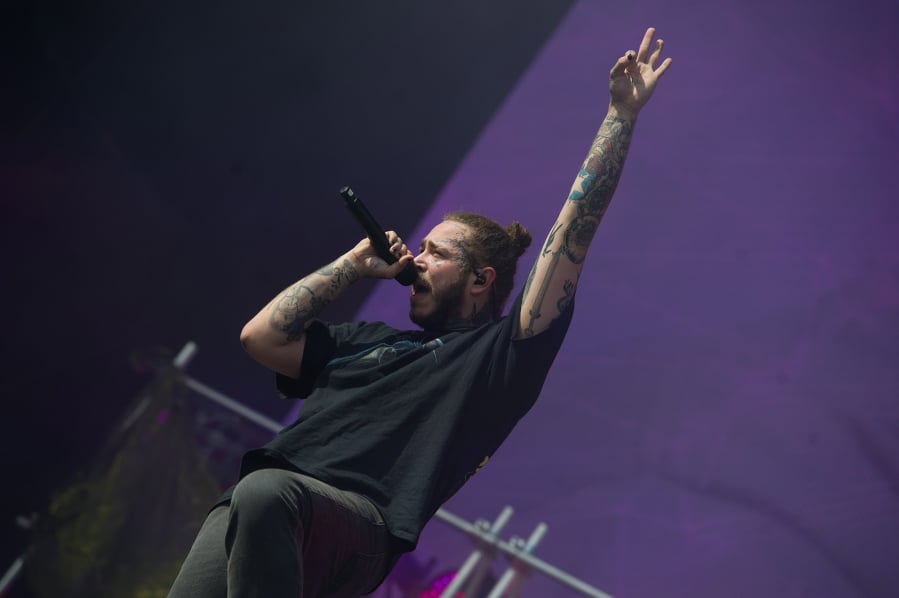 Post Malone performs on stage on the second day of Leeds Festival in August in Leeds, U.K.