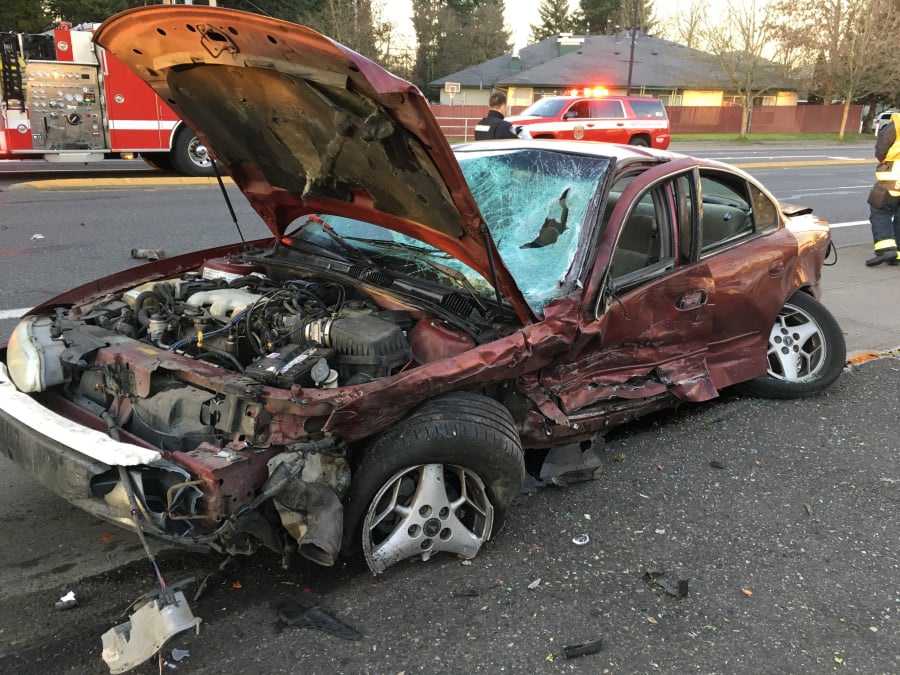 A man driving a red four-door car and a woman driving a black sport-utility vehicle side-swiped while driving in the opposite directions near Northeast 102nd Avenue and Northeast Fourth Plain Boulevard, Vancouver firefighter-paramedic Joe Hudson said.