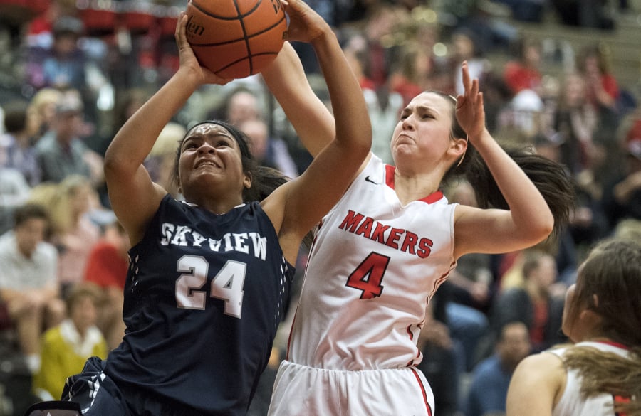 Camas’ Regan Cooke (4) gets position to block the shot of Skyview’s Mikelle Anthony (24) during Friday’s 4A Greater St. Helens League game at Camas High School.