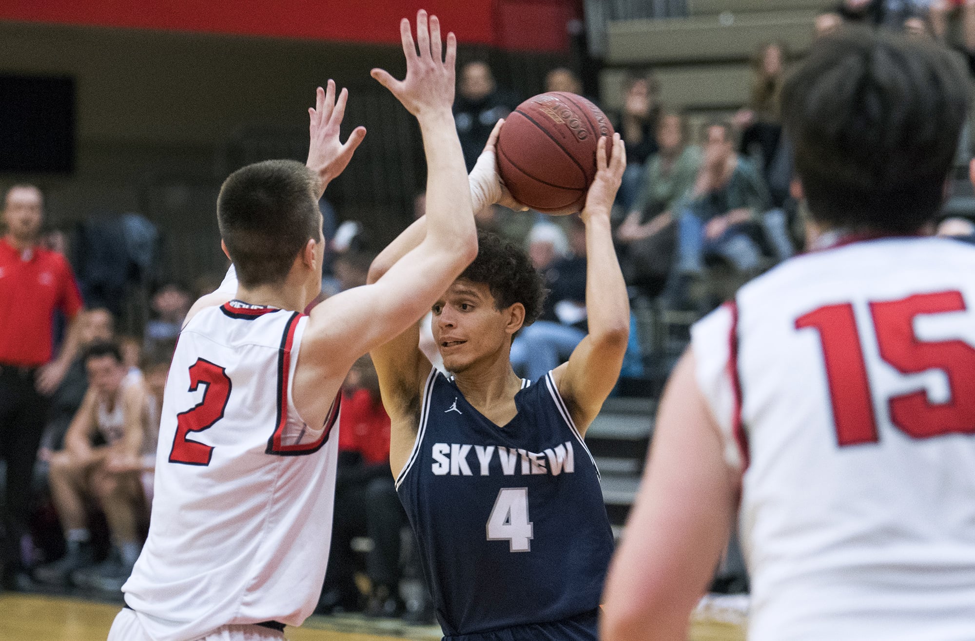 Skyview's Squeeky Johnson (4) looks to pass during Friday night's game against Camas at Camas High School on Jan. 11, 2019.